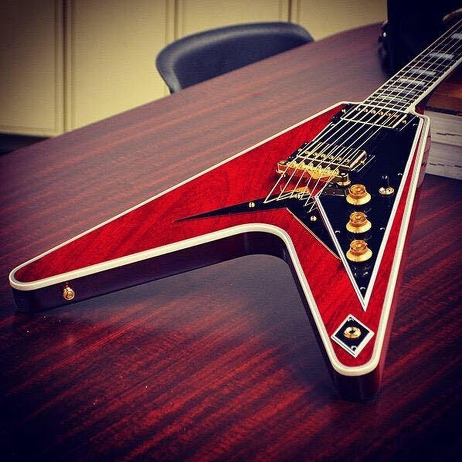 Flying v. Гибсон Флаинг v. Gibson Flying v Red. Электрогитара Gibson Flying v. 1974. Гибсон Флаинг v красная.