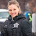 logo Tracy  Spiridakos