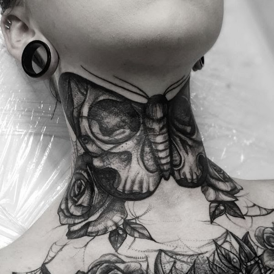 Butterfly skull neck tattoo women