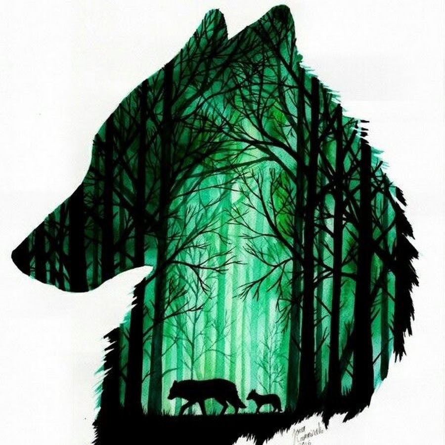 Силуэт волка на фоне леса