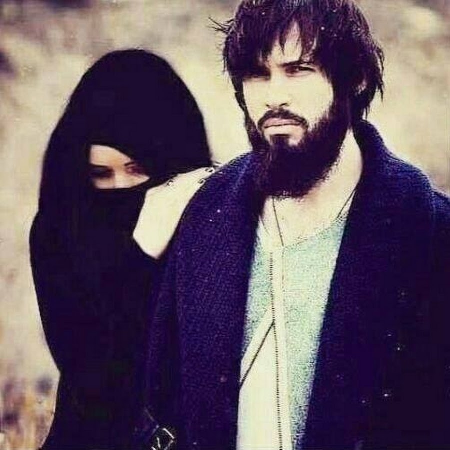 Мусульманская борода. Бородатый парень и девушка в хиджабе.