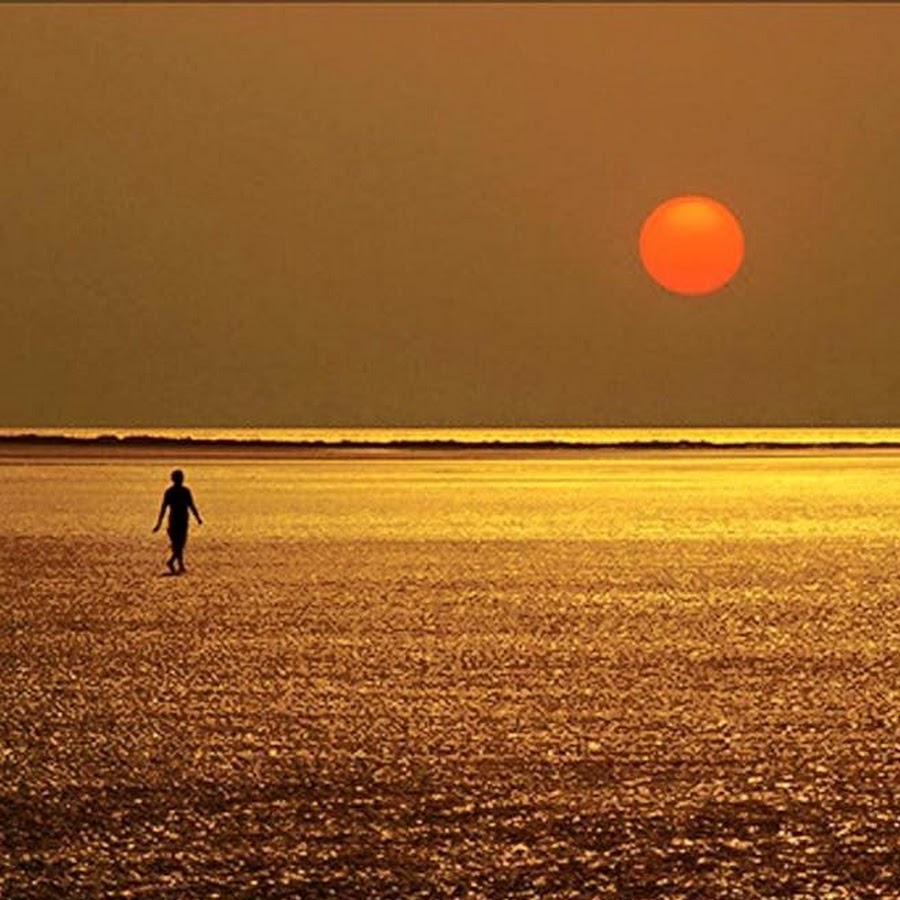 Setting sun. Sandro Sunset. Solitary Figure on the Horizon. Solitary person.