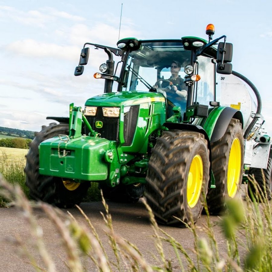 Стоящие тракторы. John Deere 5125r. John Deere трактор. John Deere 5125r технические. Колесные трактора Джон Дир.