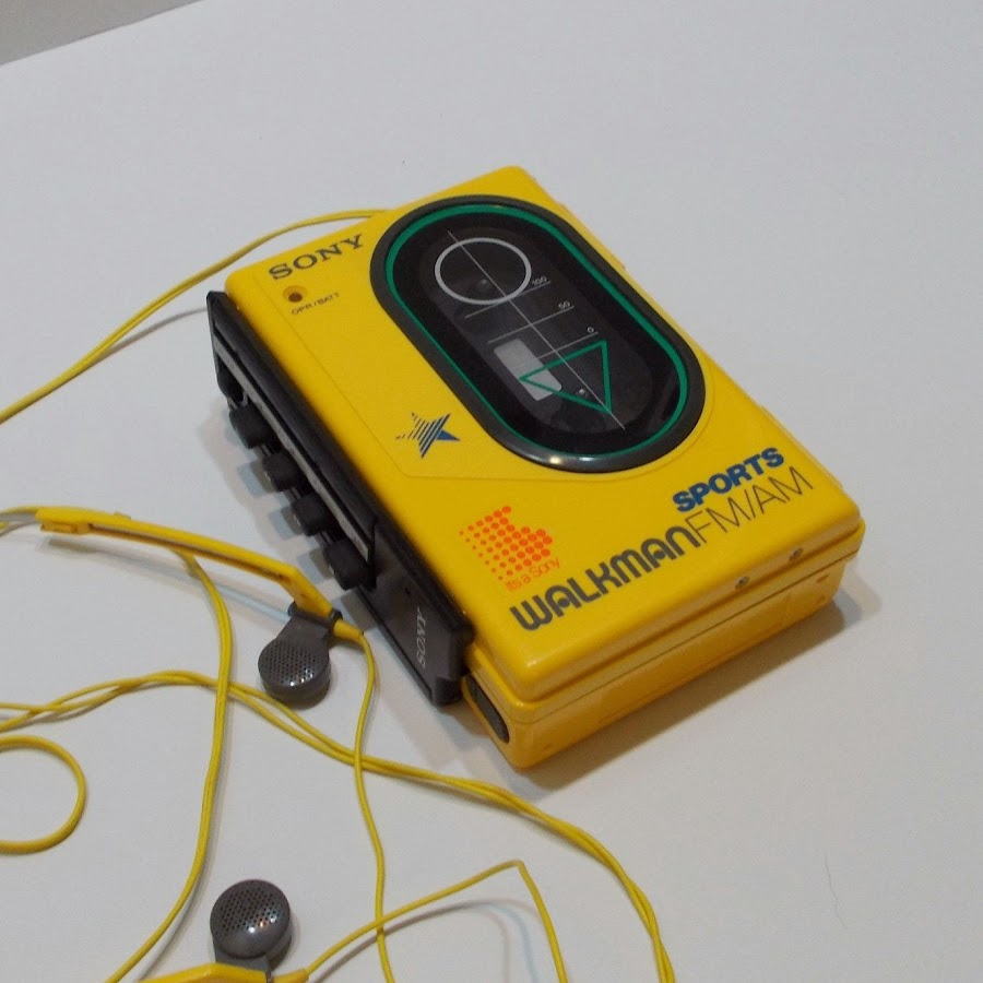 yellow walkman cassette player