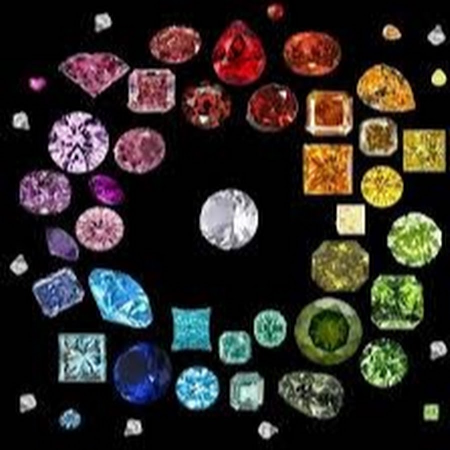 Россыпь самоцветов. Граненые камни минералы Самоцветы. Цветные бриллианты. Разноцветные Алмазы. Россыпь драгоценных камней.